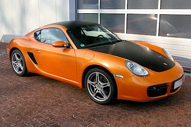 Vollverklebung Porsche Cayman Von Dunkelblau In Orange Glitzer Und Schwarz Matt