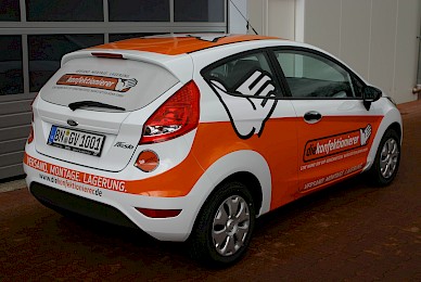 Fahrzeugbeschriftung Ford Fiesta Teilbeklebung Orangedie Konfektionierer