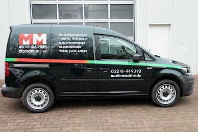 Vollverklebung Vw Caddy In Sonderfarbe British Racing Green Metallic Und Beschriftung