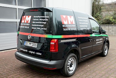 Vollverklebung Vw Caddy In Sonderfarbe British Racing Green Metallic Und Beschriftung